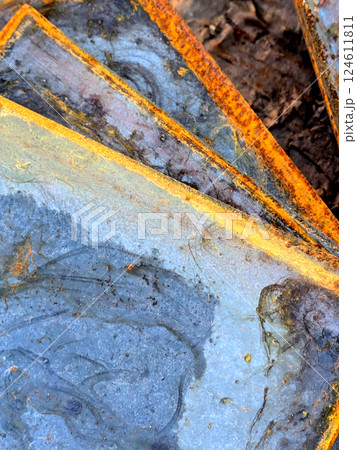 Close up of Heavily Rusted Blue Steel Metal Plate with Orange corrosion Close Up Background Close up of Heavily Rusted Blue Steel Metal Plate with Orange corrosion Close Up Background 124611811