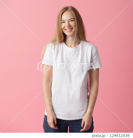 Smiling Young Woman in White T-Shirt 124612036