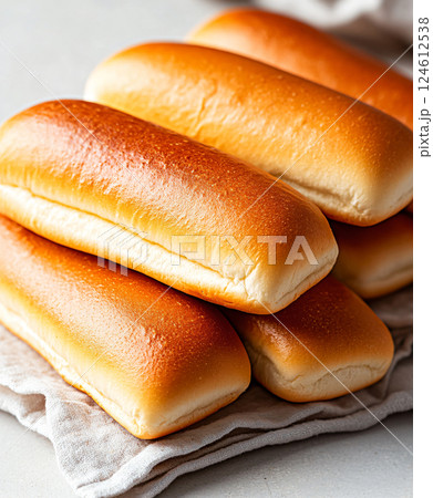 Wheat bread. baked hot dog buns on white background. AI Generated. Wheat bread. baked hot dog buns on white background. AI Generated. 124612538