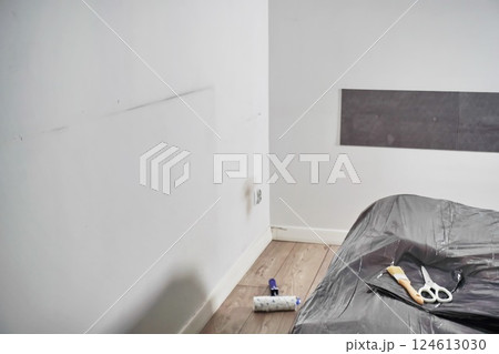 white dirty, greasy, stained walls before renovation in room. co white dirty, greasy, stained walls before renovation in room. co 124613030