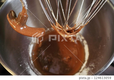 the close-up dough making in stainless steel bowl. food processor to kneading gingerbread 124613059