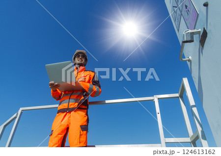 Asian Engineer male worker checking service maintenance wind turbine clean electricity power station Asian Engineer male worker checking service maintenance wind turbine clean electricity power station 124613162