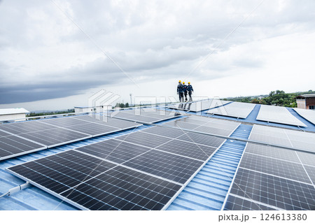 Engineer worker team install, maintenance service replacing solar panel work at height roof 124613380