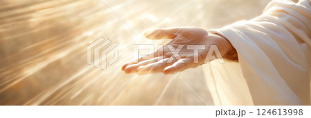 Hand of Jesus reaching out with light in spiritual scene, religious concept background Hand of Jesus reaching out with light in spiritual scene, religious concept background 124613998