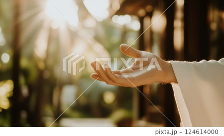 Hand of Jesus reaching out with light in spiritual scene, copy space background Hand of Jesus reaching out with light in spiritual scene, copy space background 124614000