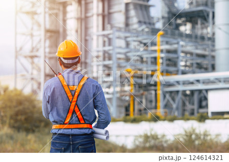 Professional Petroleum Refinery engineer man working building oil and gas power industrial plant. Professional Petroleum Refinery engineer man working building oil and gas power industrial plant. 124614321