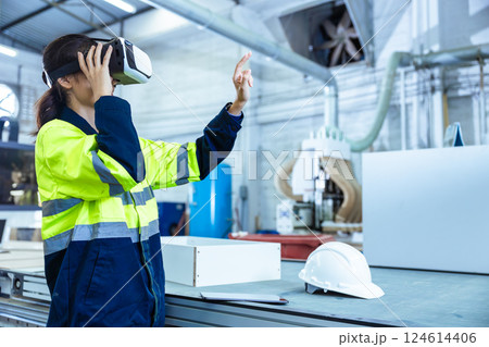 Modern Factory Innovation Technology in Industry, Technician using VR Virtual Reality Headset 124614406