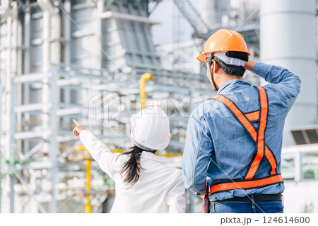 Professional Petroleum Refinery engineer team working building oil and gas power industrial plant. Professional Petroleum Refinery engineer team working building oil and gas power industrial plant. 124614600