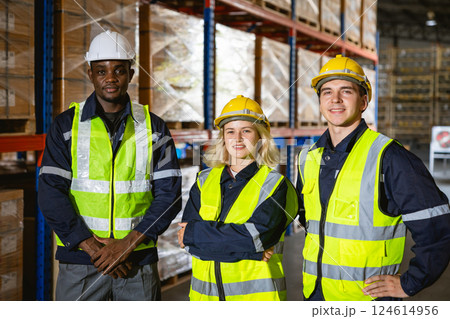 group professional warehouse worker. stock inventory team staff employee working in cargo storage 124614956