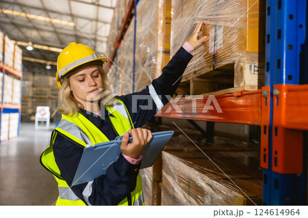 caucasian women worker. professional warehouse worker. stock inventory staff working in logistic 124614964