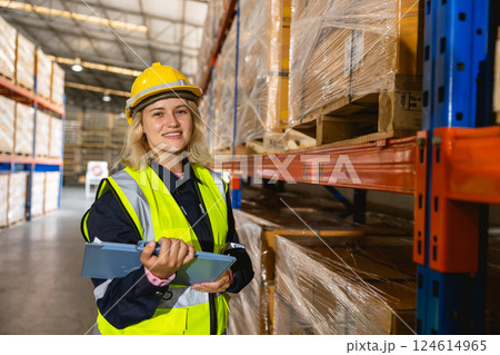 caucasian women worker. professional warehouse worker. stock inventory staff working in logistic 124614965