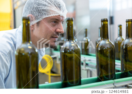 professional engineer technician man service check machine in drink factory for quality standard professional engineer technician man service check machine in drink factory for quality standard 124614981