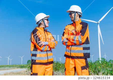 Engineer workers teamwork working together service maintenance wind turbine clean power green energy Engineer workers teamwork working together service maintenance wind turbine clean power green energy 124615134