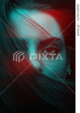 Beautiful woman cover her face with hair in RGB color split Beautiful woman cover her face with hair in RGB color split 124616092