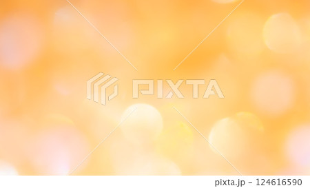 オレンジ黄色キラキラ玉ボケ背景素材　きれい光ぼかしグラデーション 124616590