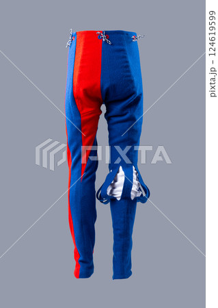 Colorful Medieval Wool Hose with Unique Design. Eye-catching legwear featuring vibrant blue and red sections with decorative details. 124619599