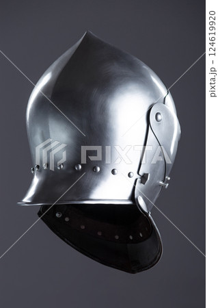 Polished Silver Medieval Armet Helmet with Perforated Visor. This shiny silver armet features a rounded skull, a protective bevor, and a visor with multiple small perforations. Polished Silver Medieval Armet Helmet with Perforated Visor. This shiny silver armet features a rounded skull, a protective bevor, and a visor with multiple small perforations. 124619920