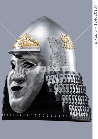 Silver Samurai Helmet with Ornate Gold Details and Fierce Mask. This image showcases a silver samurai helmet with intricate gold decorations on the crown and a detailed face mask with a stern Silver Samurai Helmet with Ornate Gold Details and Fierce Mask. This image showcases a silver samurai helmet with intricate gold decorations on the crown and a detailed face mask with a stern 124620137
