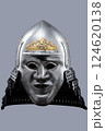 Silver Samurai Helmet with Ornate Gold Details and Fierce Mask. This image showcases a silver samurai helmet with intricate gold decorations on the crown and a detailed face mask with a stern 124620138
