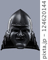 Dark Samurai Helmet with Menacing Face Mask. This image features a dark, almost black, samurai helmet with a detailed face mask displaying a fierce expression. 124620144