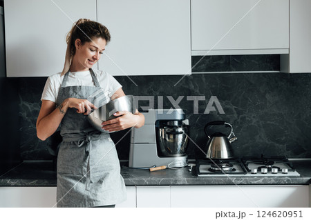 Woman preparing food cookies in the kitchen for dinner 124620951