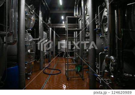Barrels at an alcohol brewery 124620989