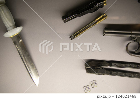 Diving knife and underwater pistol 124621469