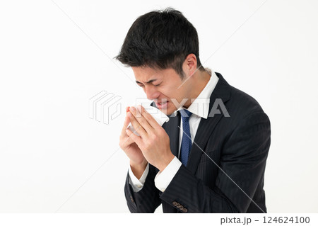 体調不良の男性 124624100