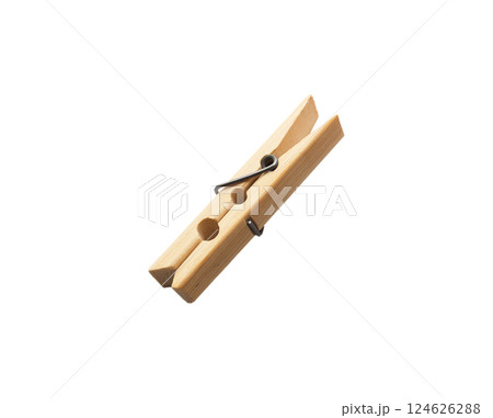 One decorative wooden clothespin isolated on white background. Office clothespins. One decorative wooden clothespin isolated on white background. Office clothespins. 124626288