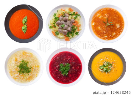 Set of plates of soup isolated on white background 124628246