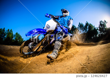 Enduro bike rider 124628427