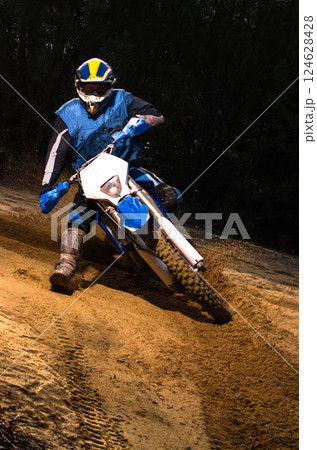 Enduro bike rider Enduro bike rider 124628428