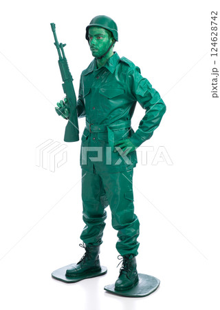 Man on a green toy soldier costume 124628742