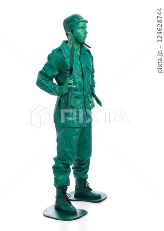 Man on a green toy soldier costume 124628744