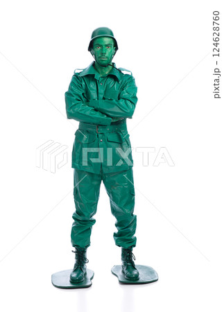 Man on a green toy soldier costume 124628760