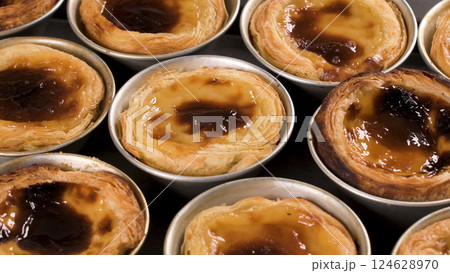 Freshly cooked egg tarts 124628970