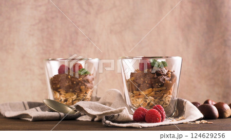 Couple of glasses of chocolate and chestnuts mousse 124629256