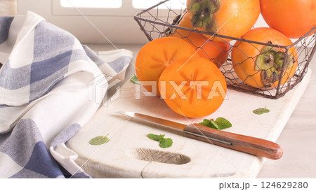 Delicious fresh persimmon fruit Delicious fresh persimmon fruit 124629280