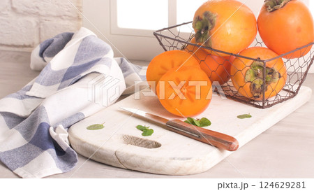 Delicious fresh persimmon fruit 124629281