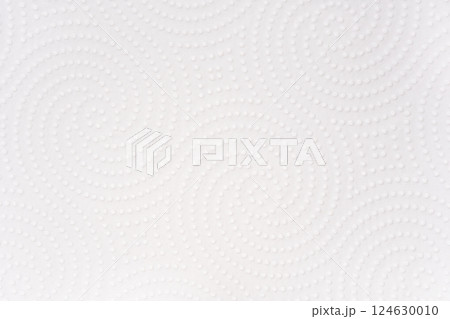 The texture of a white paper towel. Macro. Soft, delicate paper. 124630010