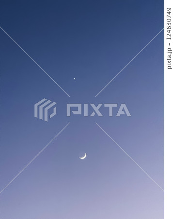 Crescent Moon and Bright Star in Twilight Sky Crescent Moon and Bright Star in Twilight Sky 124630749