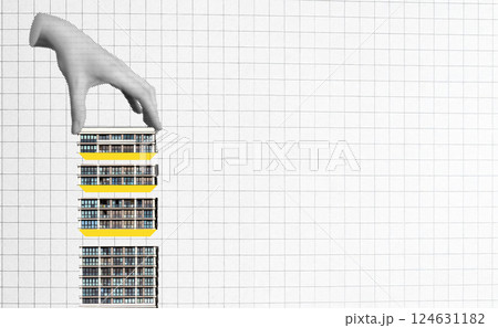 Construction and architecture project in progress. Hand assembling geometric building blocks, Construction and architecture project in progress. Hand assembling geometric building blocks, 124631182