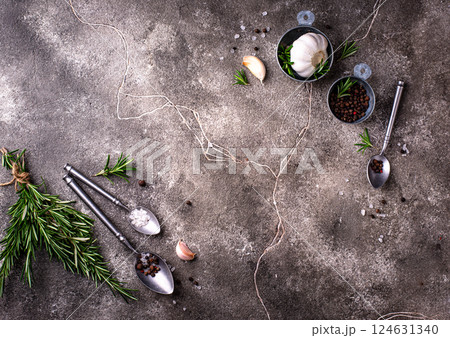 Rosemary, garlic, salt and pepper. Rosemary, garlic, salt and pepper. 124631340
