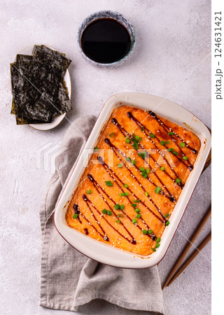 Baked sushi roll cake with crab surimi sticks Baked sushi roll cake with crab surimi sticks 124631421
