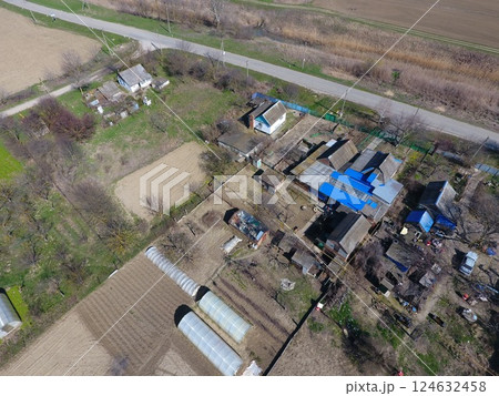 Village view from above, vegetable gardens and gardens in the village Village view from above, vegetable gardens and gardens in the village 124632458