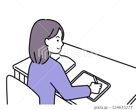 参考書を見てタブレットPCに書いて勉強する女性 124633277