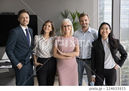 Portrait of five international staff members posing at workplace Portrait of five international staff members posing at workplace 124633915