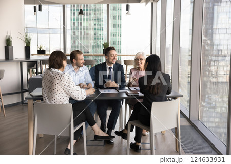 Group of businesspeople take part in meeting in modern office Group of businesspeople take part in meeting in modern office 124633931