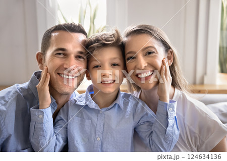 Head shot portrait of happy family with cute little son 124634136