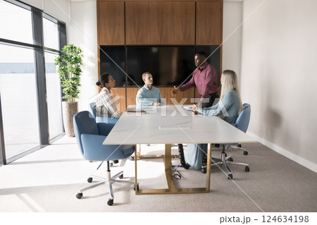 Engaged team participate briefing or training led by African boss Engaged team participate briefing or training led by African boss 124634198